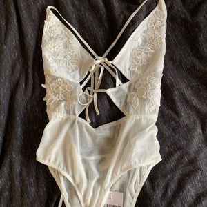 NWT gorgeous lace floral bodysuit